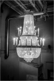 Majestic chandelier illuminating the darkened space