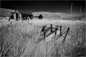 Abandoned structures in Bodie, showcasing remnants of a historic mining town.