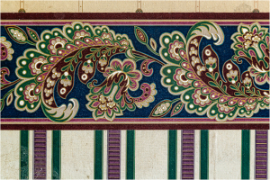 Intricate floral design on fabric showcasing historical textile patterns.