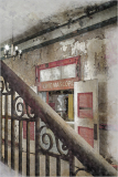 Historic Everett Square Theatre ticket booth with vintage design and worn walls.
