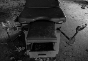 Medical exam table left to decay