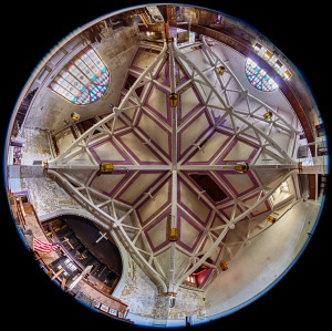 A grand ceiling adorned with intricate patterns and vibrant colors, evoking a sense of wonder.