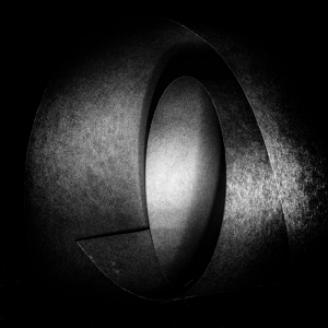 Abstract sculptural form with smooth curves and varying shades of gray.