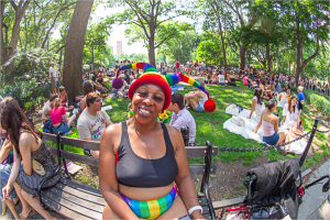 A joyful celebration of Pride Day in NYC, with vibrant colors and diverse faces.
