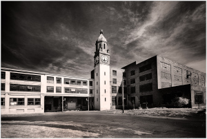 Historic Scranton Lace Building with clock tower and modernist architecture.