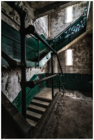 A decaying staircase enveloped in shadows, hinting at forgotten tales; green hues create a dreamlike aura.