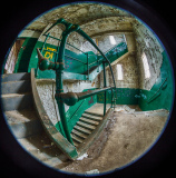 A spiraling staircase wrapped in green shadows, time twists in layers of decay.